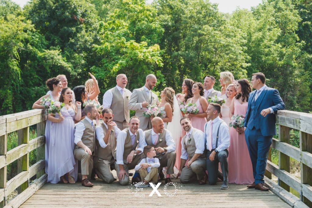 bridal party on the bridge outside Pavilion at Sunken Meadow