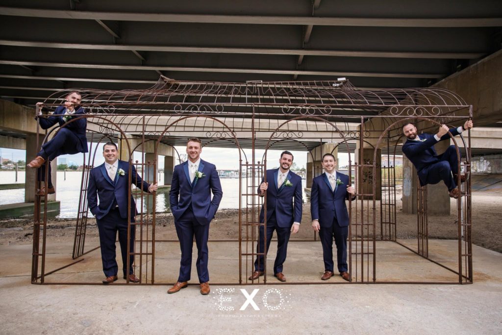 Groom and groomsmen at The Loft at Bridgeview Yacht Club