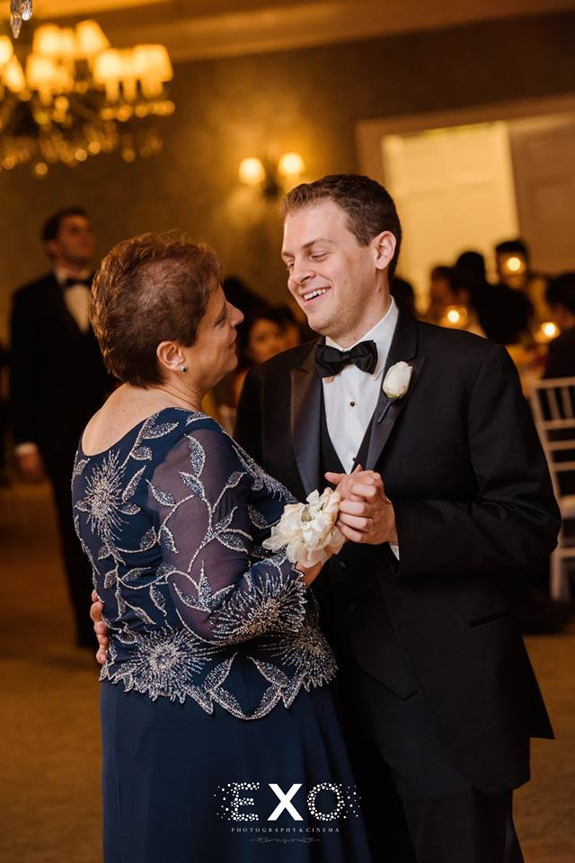 groom and mother dancing