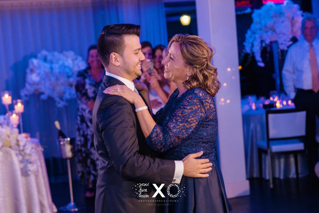 groom and his mother dancing at Harbor Club at Prime
