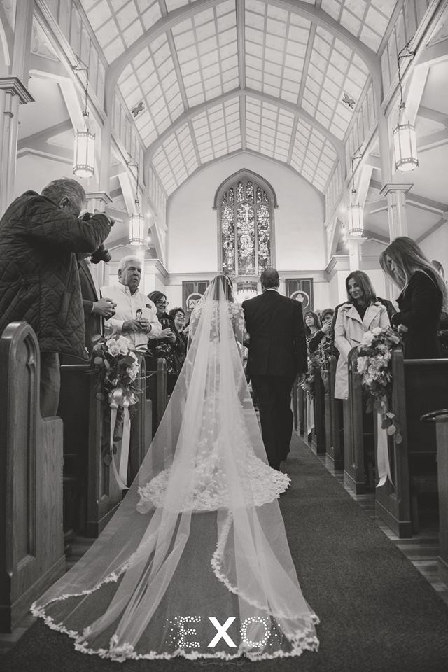 bride walking down the aisle, rear-view