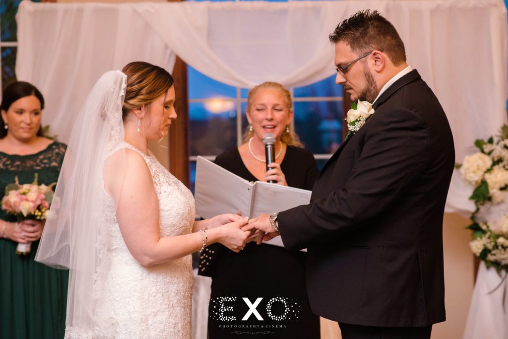 bride and groom exchanging vows