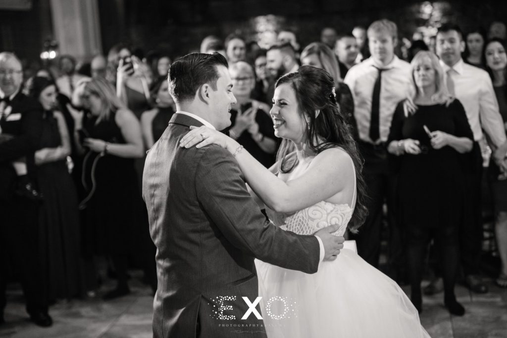 bride and groom dancing in black and white at Fox Hollow