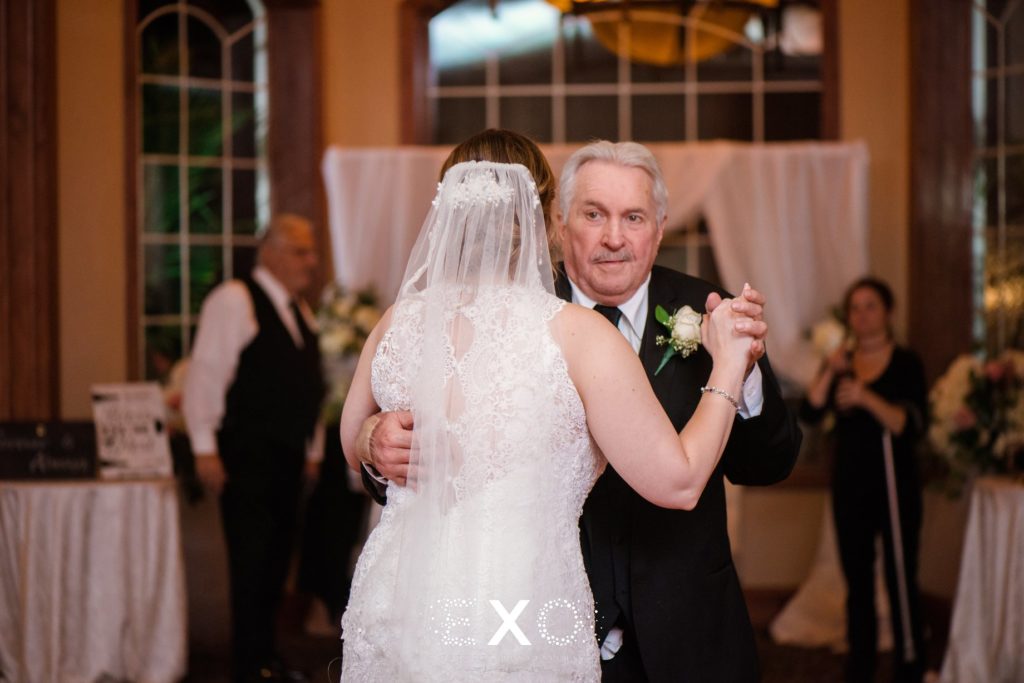 bride and father dancing