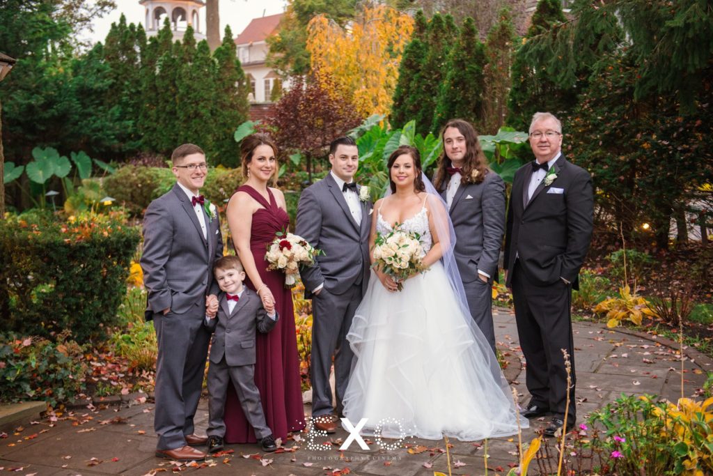 Bride and groom with brides family at Fox Hollow