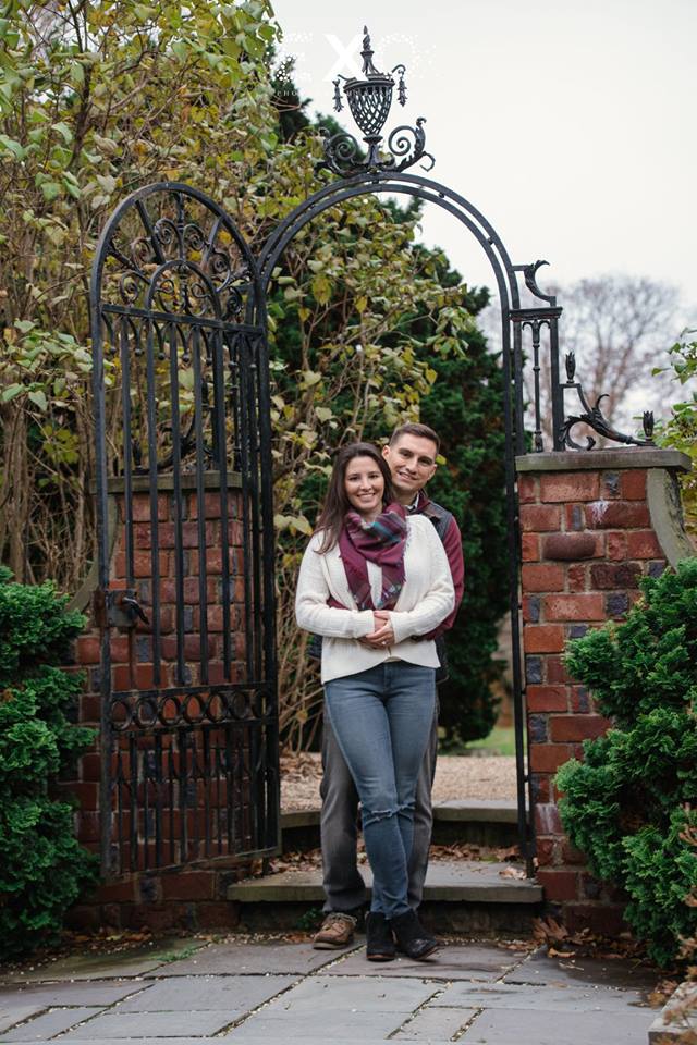Couple posing by the gates