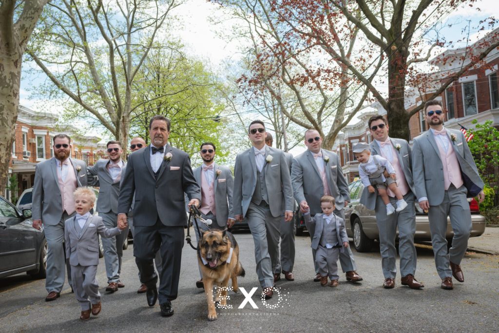 groom and groomsmen walking to Bridgeview Yacht Club