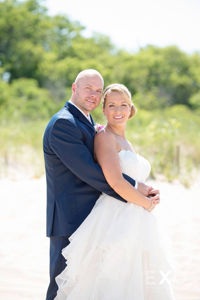 bride and groom smiling at Pavilion at Sunken Meadow