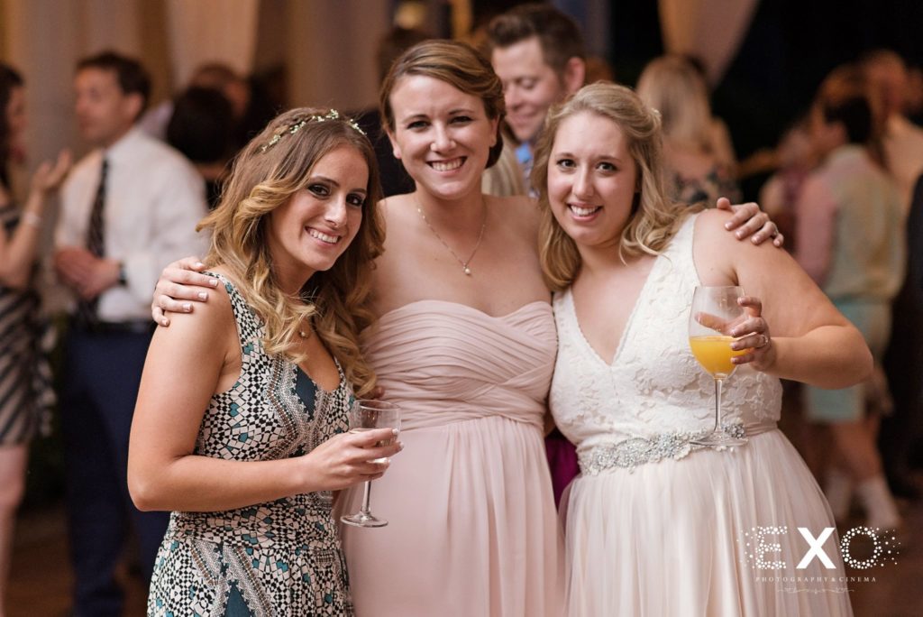 bride and guests smiling at Centerport Yacht Club