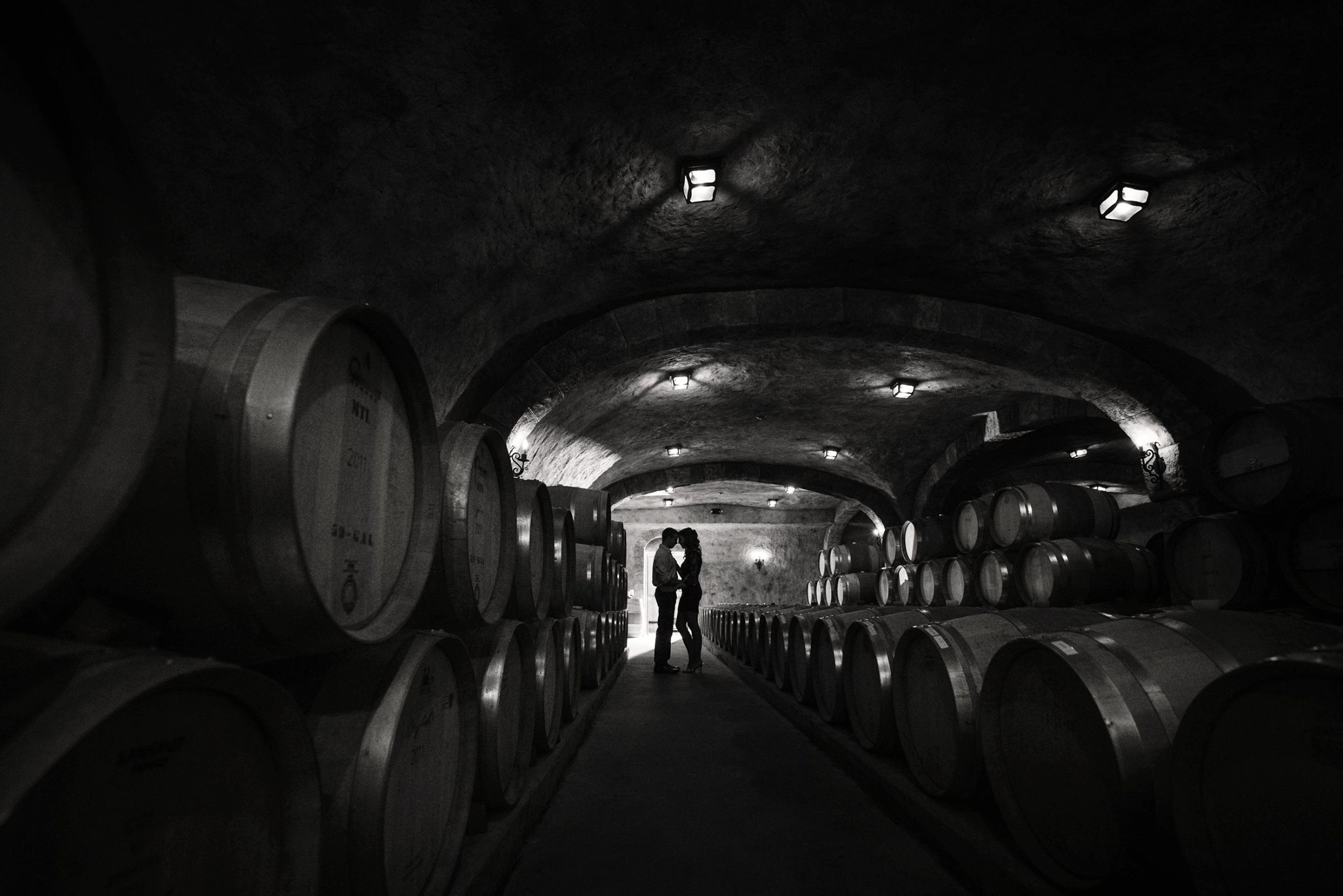 couple in wine cellar at Rafael Vineyard