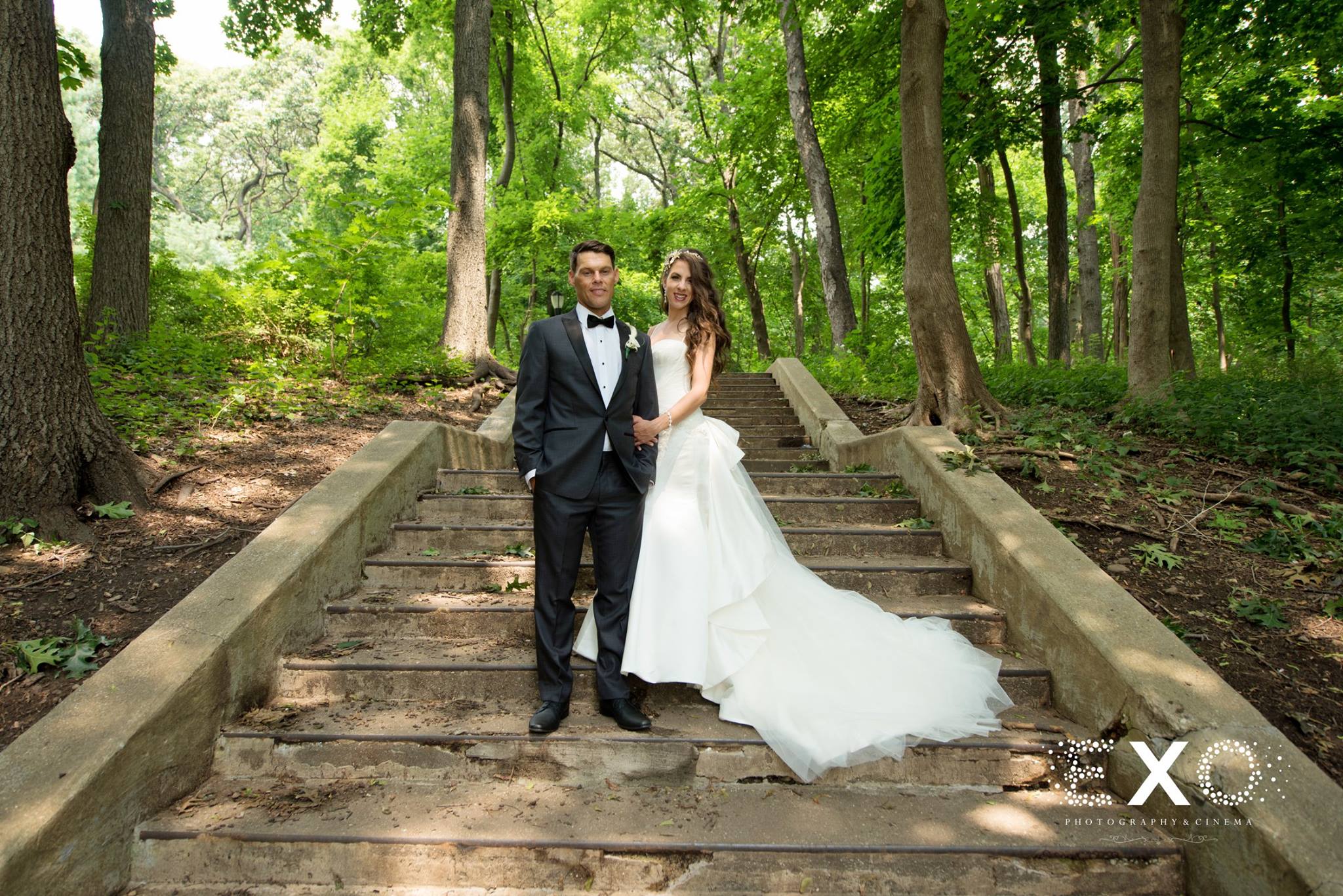 bride and groom outside on steps at Villa Russo