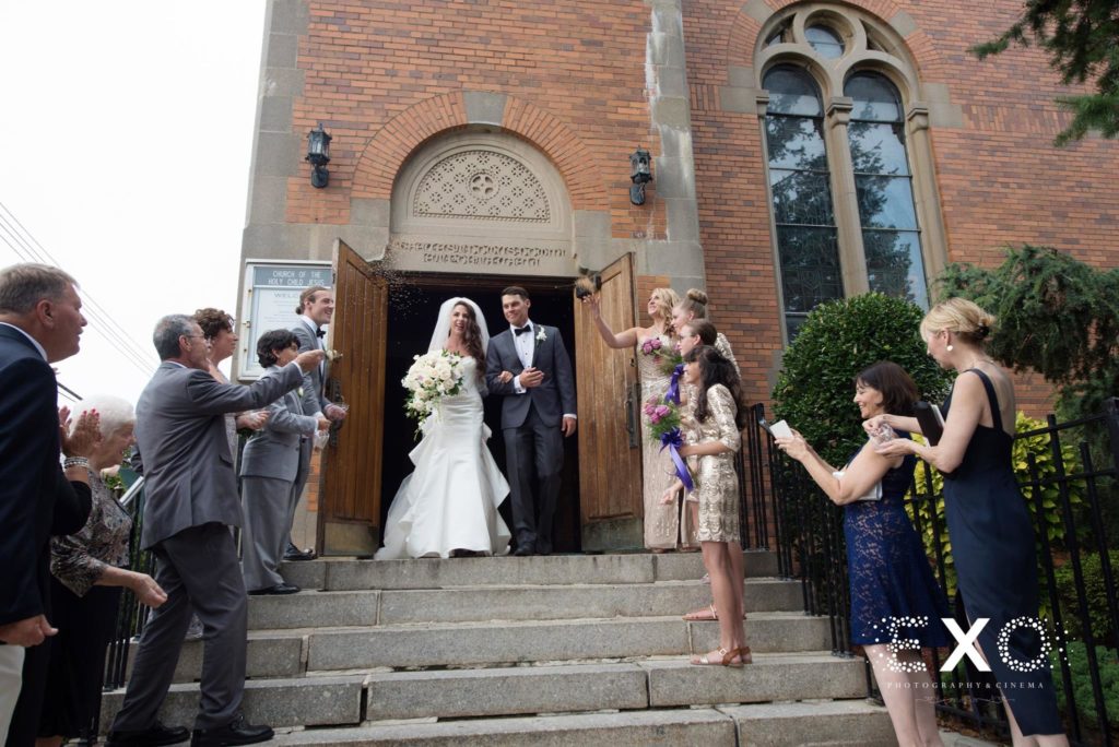 bride and groom leaving church