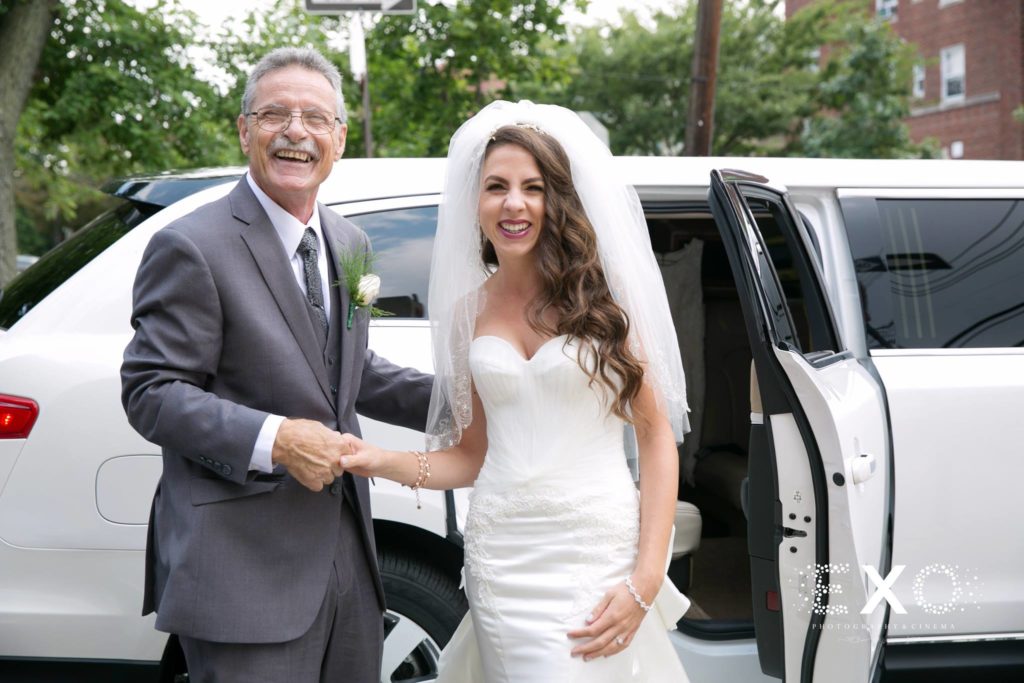 bride and father getting out of limo