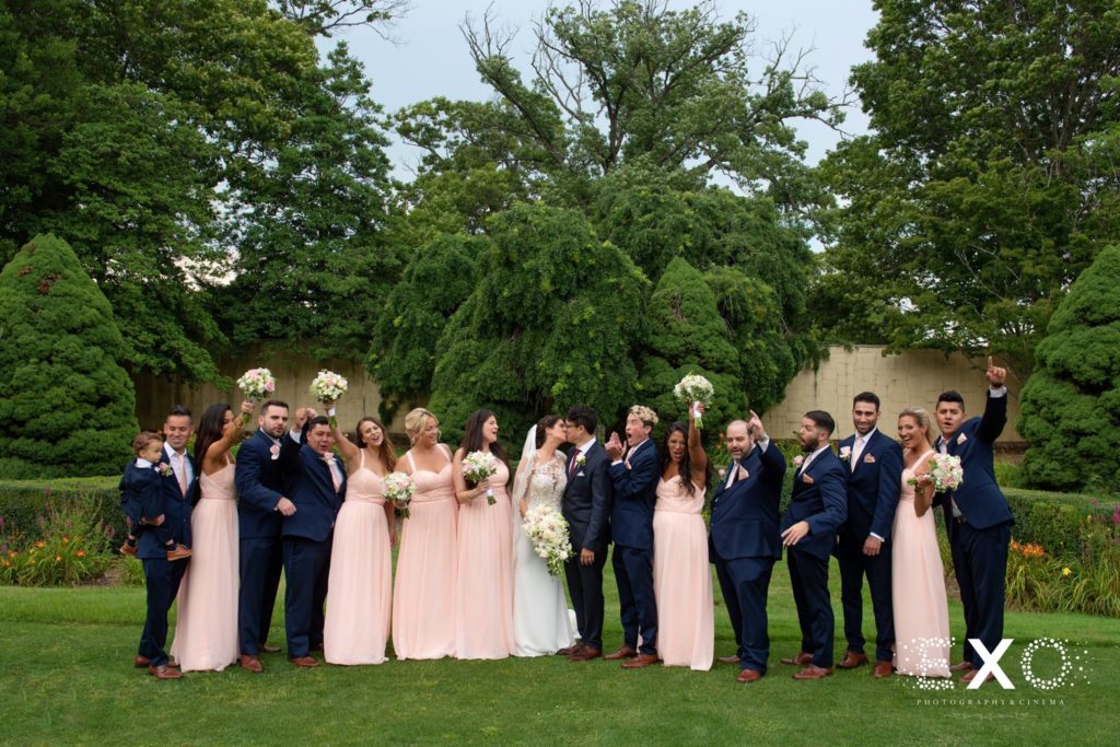 bride and groom with bridal party at The Mansion at Oyster Bay