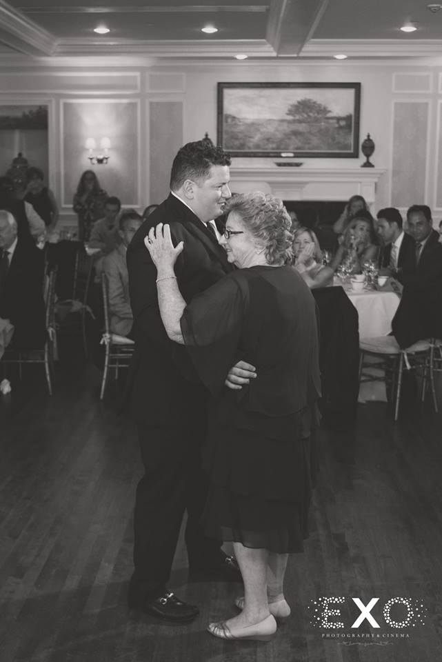 groom and mother dancing at Huntington Country Club