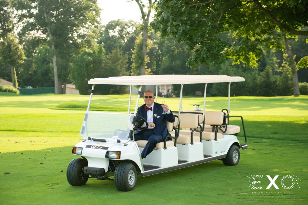 guest on golf cart at Huntington Country Club