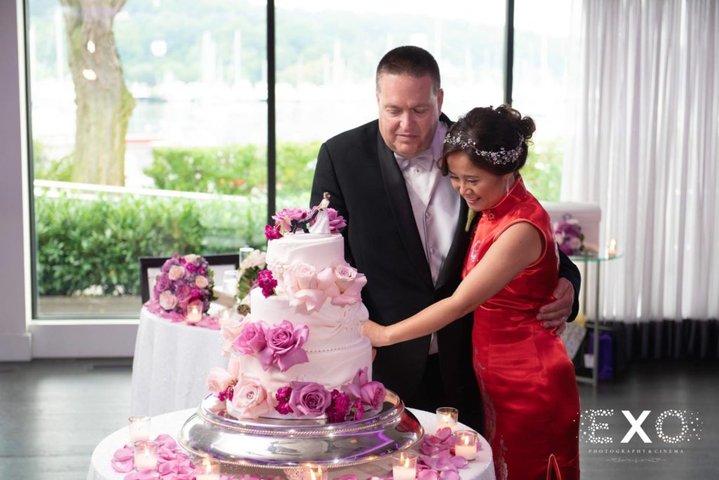 bride and groom cutting cake at Harbor Club at Prime