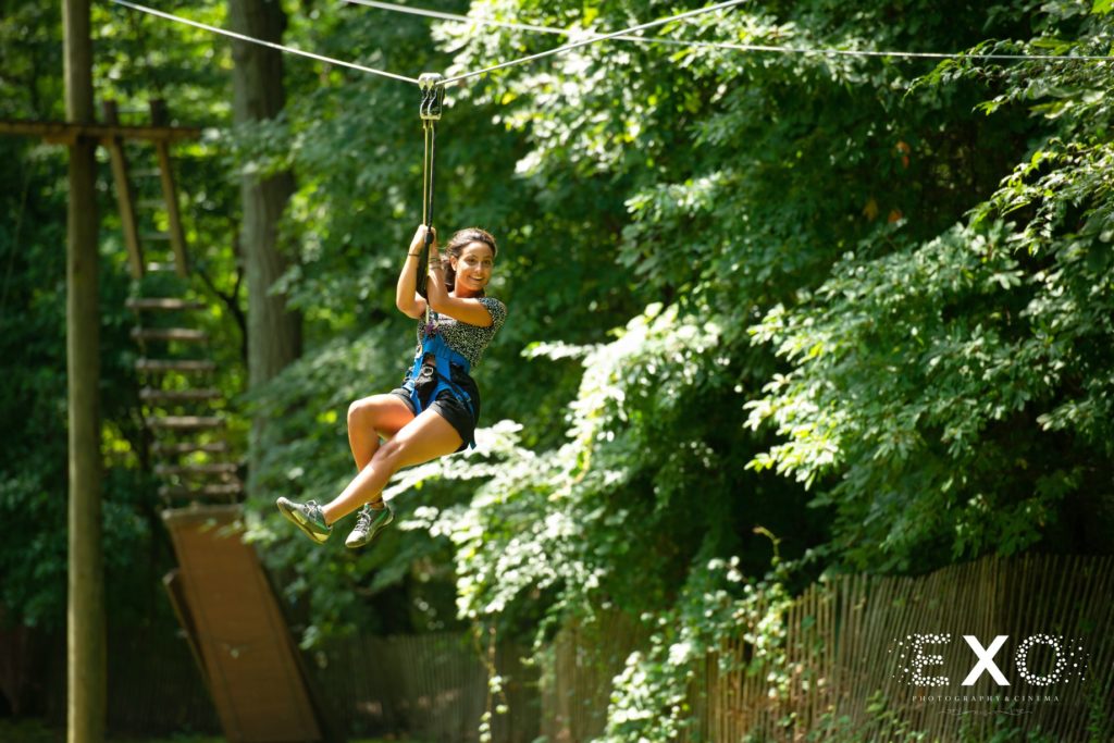 guest on zipline at Crestwood Country Day Camp