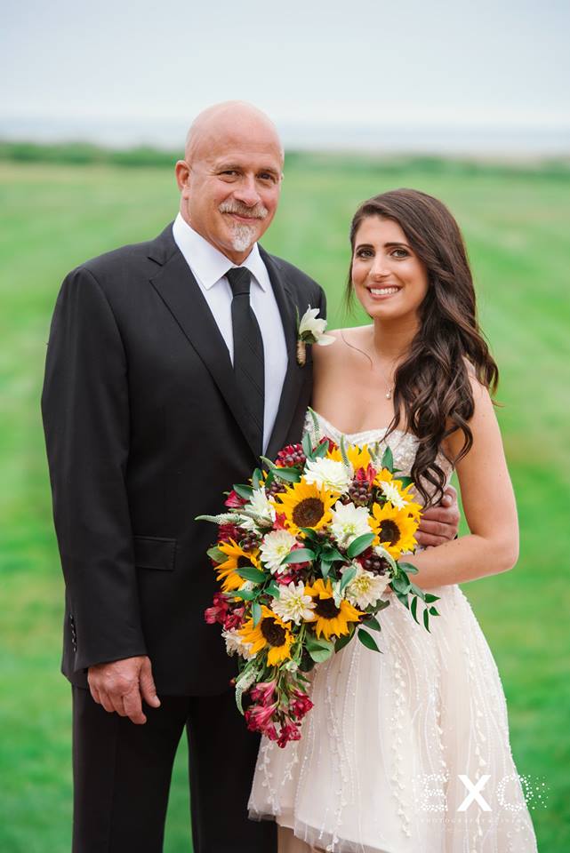 bride smiling with her father at Bourne Mansion