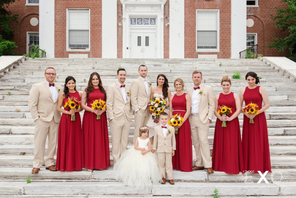 bride and groom with bridal party at Bourne Mansion