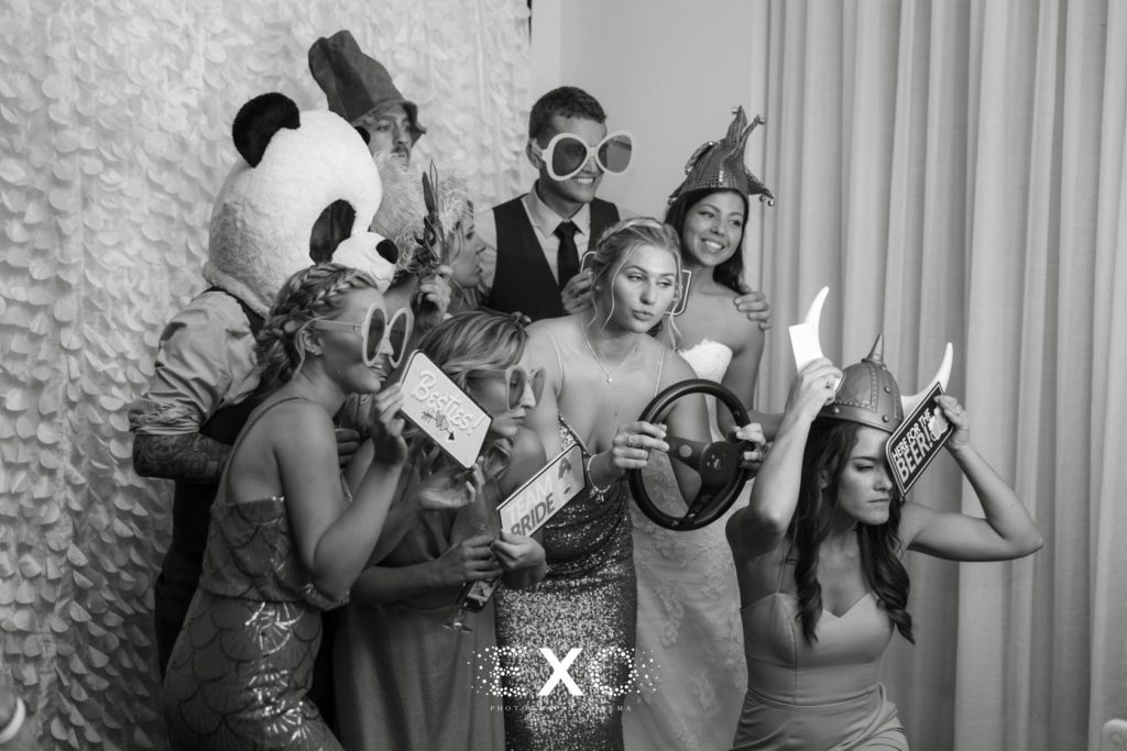 bride groom and guests in the photo booth at The Carltun
