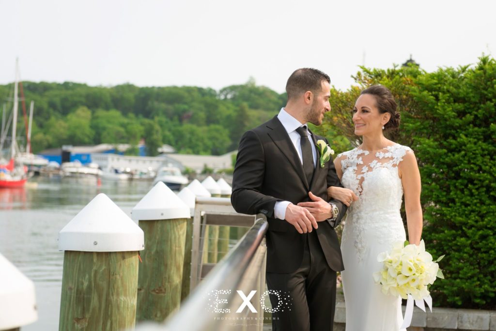 bride and groom on boardwalk at Harbor Club at Prime