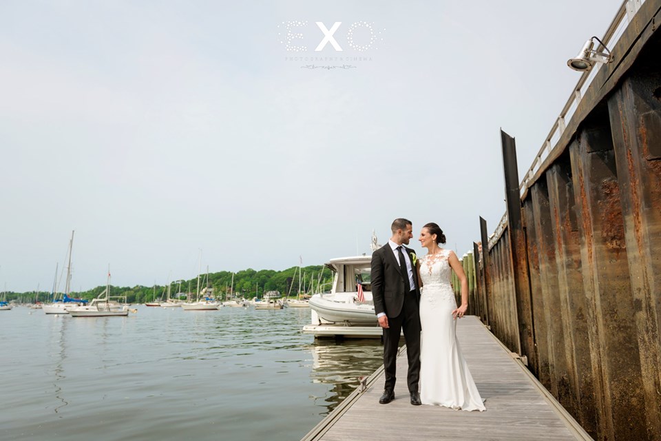 bride and groom on dock at Harbor Club at Prime