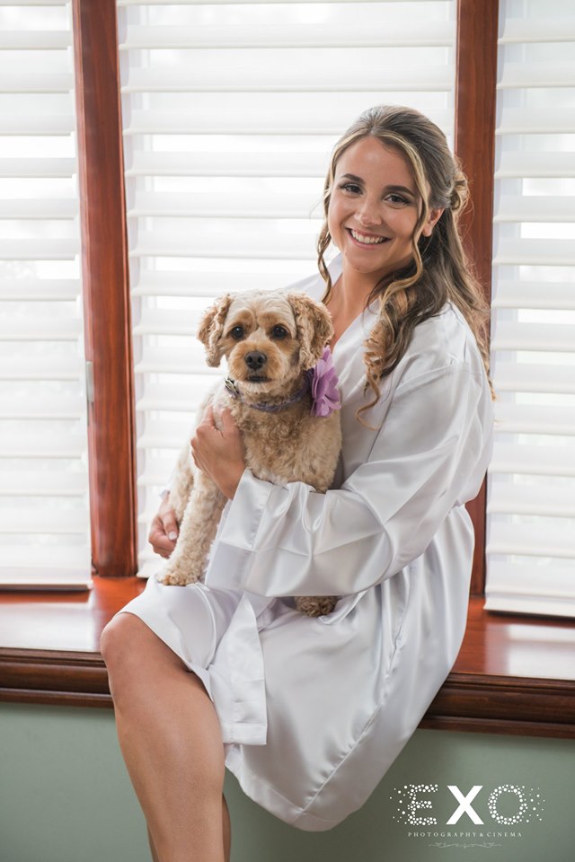 bride in robe with dog