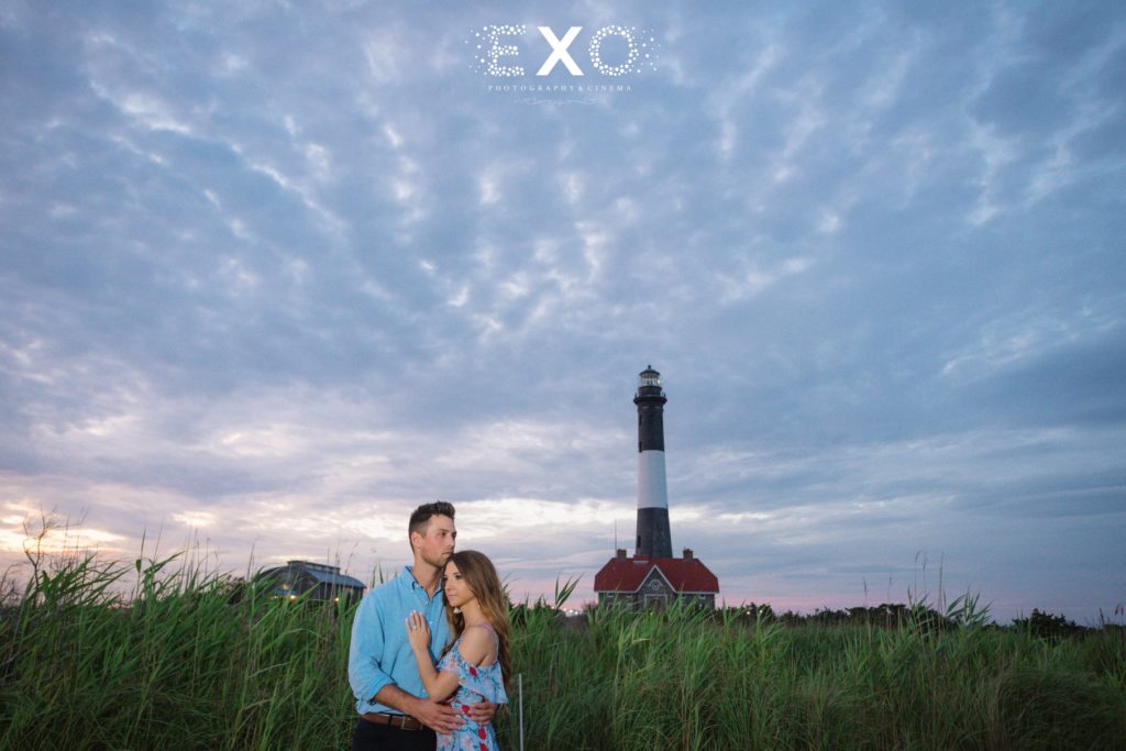 couple in front of Fire Island Lighthouse