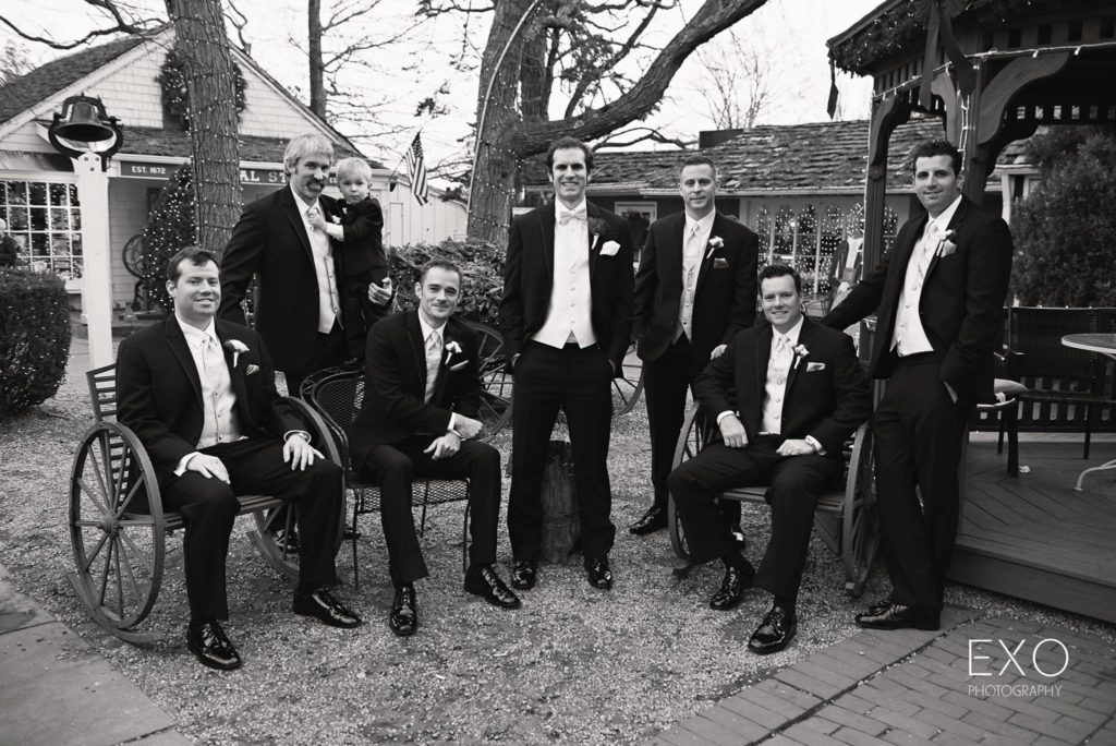 groom and groomsmen outside The Milleridge Cottage