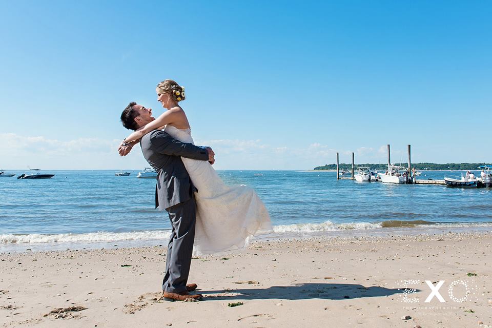 bride and groom on the beach at The Head of the Bay Club