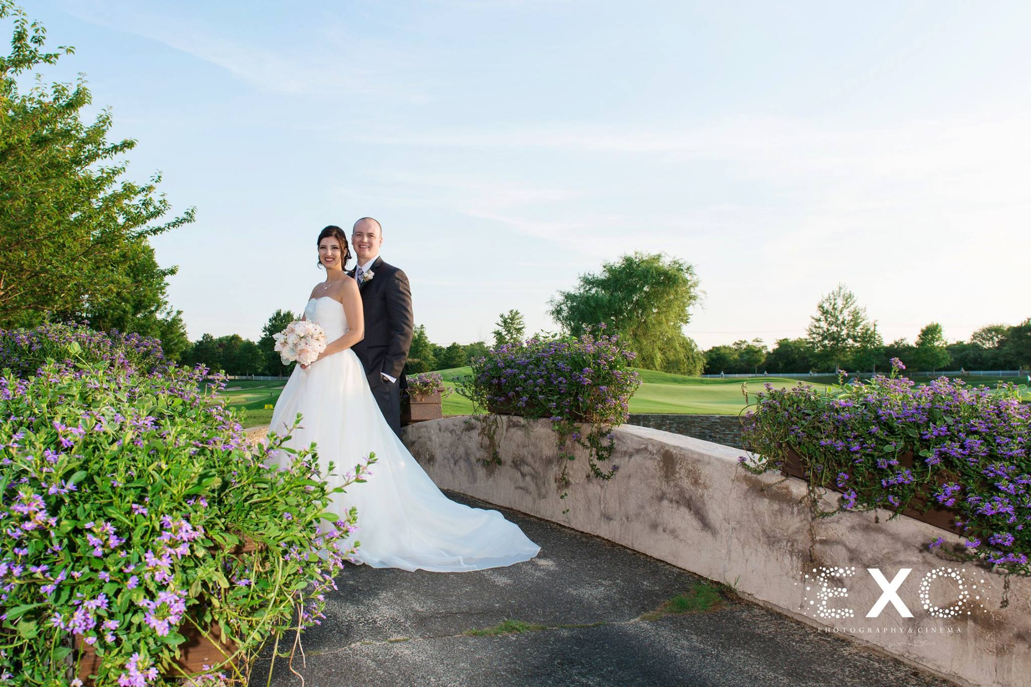 bride and groom outside Willow Creek Golf and Country Club