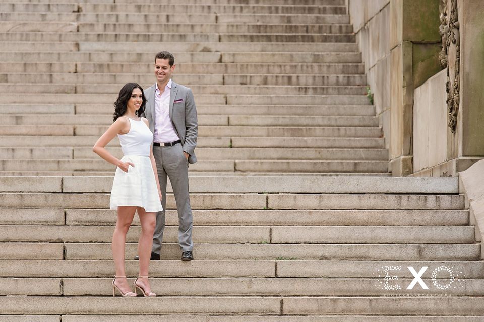 couple standing on steps