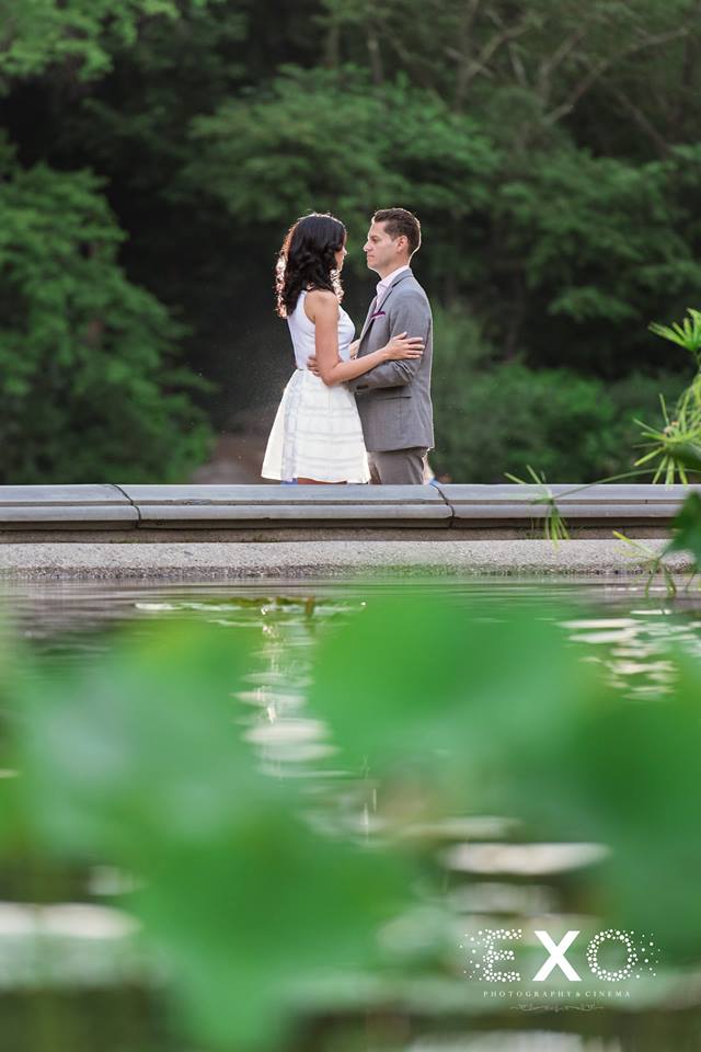 couple standing by water