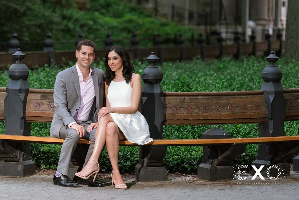 couple sitting on bench in Central Park
