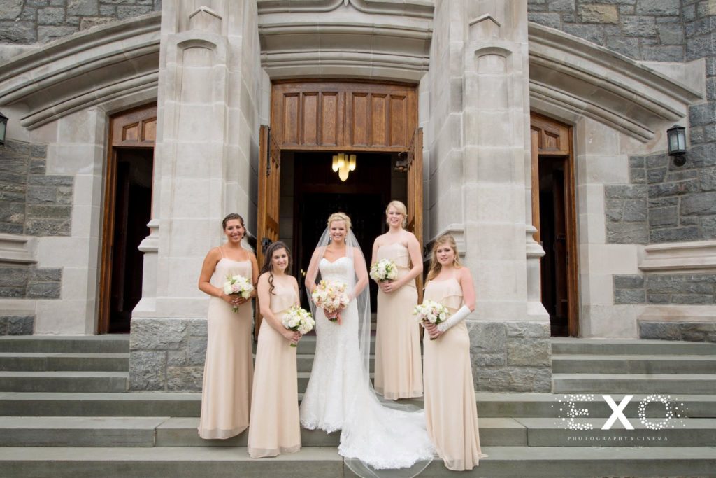 bride and bridesmaids outside the church