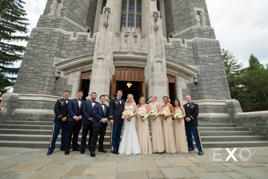 bridal party in front of the church