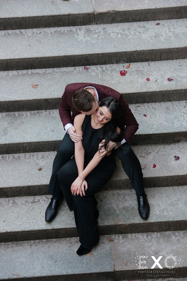couple sitting on steps in Central Park