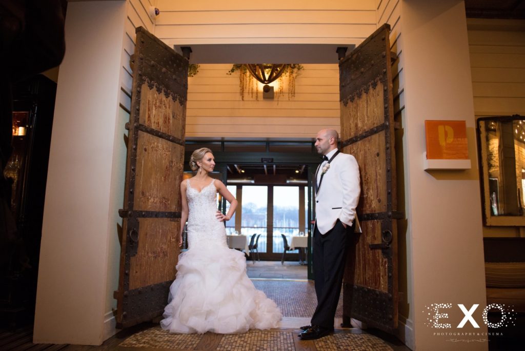 bride and groom in doorway