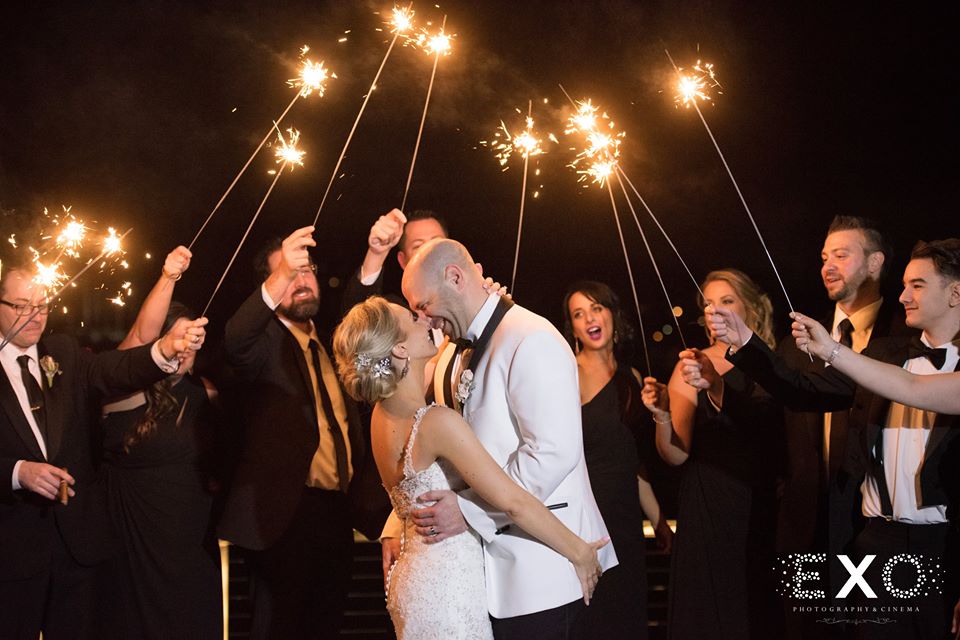 bride and groom getting a sparkler sendoff from Harbor Club at Prime
