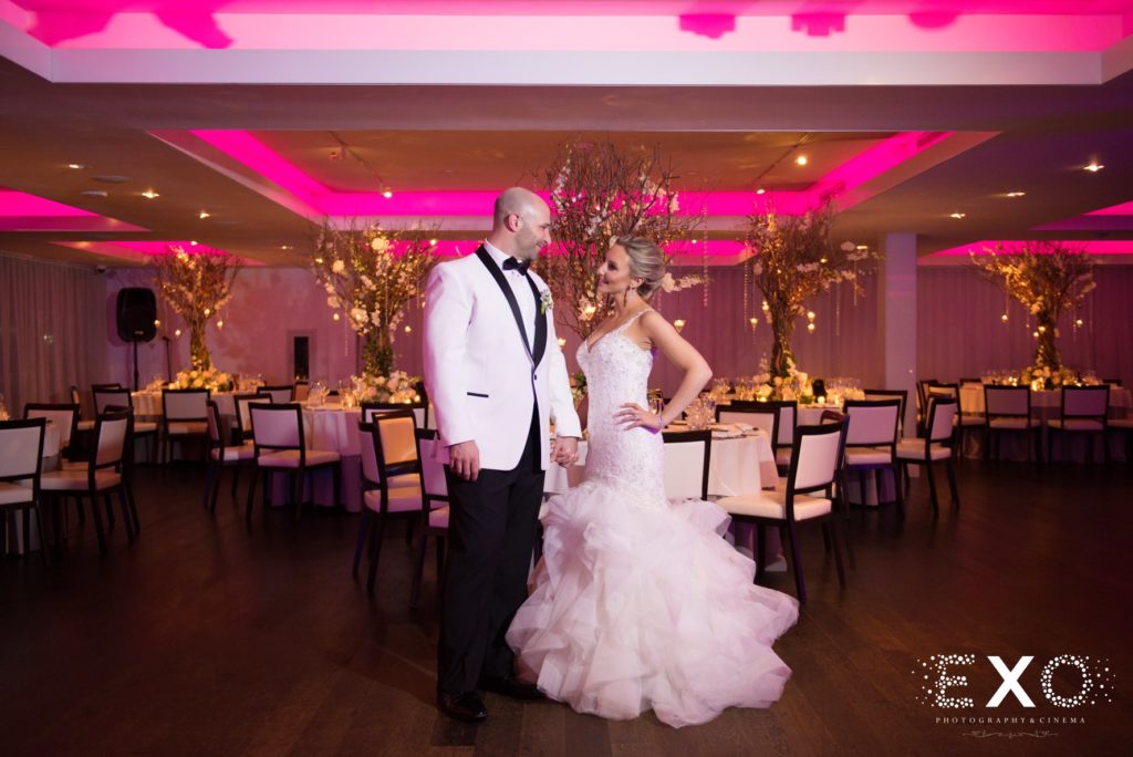 bride and groom in ballroom at Harbor Club at Prime