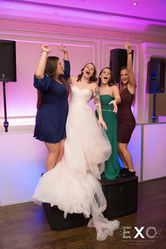 bride and friends dancing at The Inn at New Hyde Park