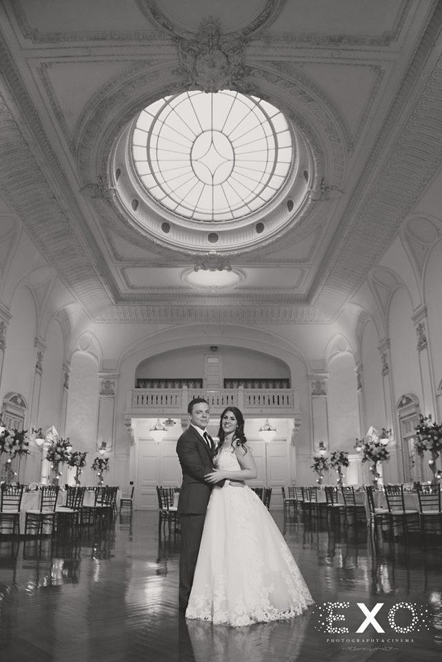 bride and groom in ballroom at Bourne Mansion