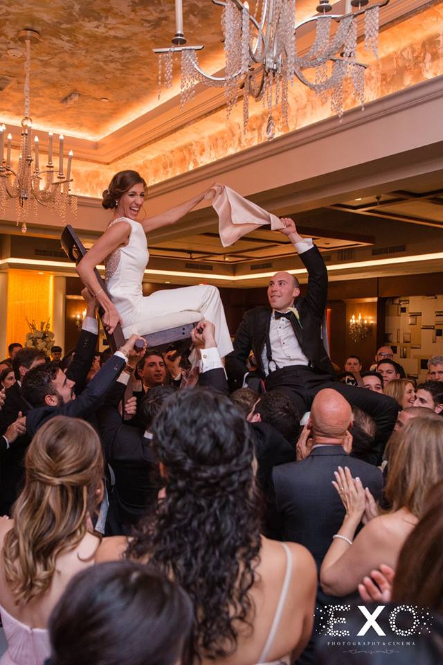bride and groom during hora at Temple Beth Torah