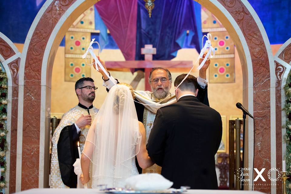 couple at altar during ceremony