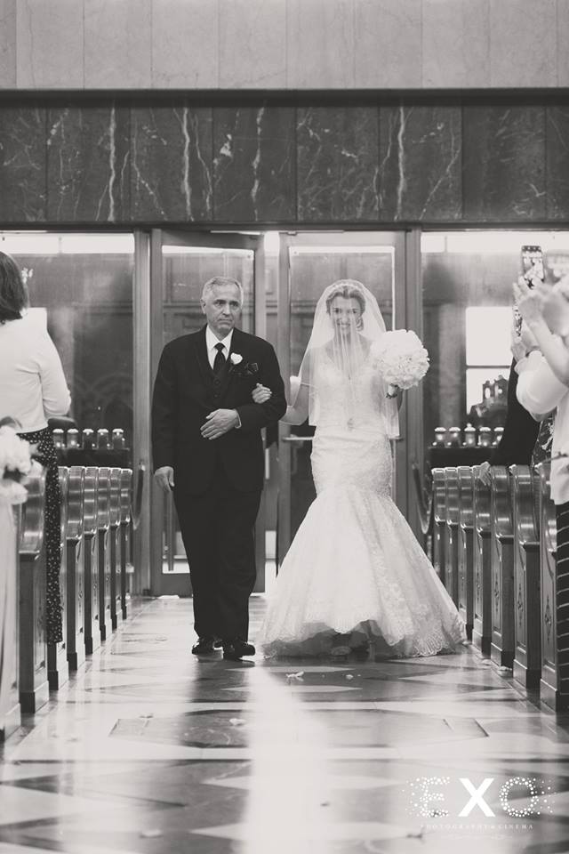 bride and father walking down the aisle