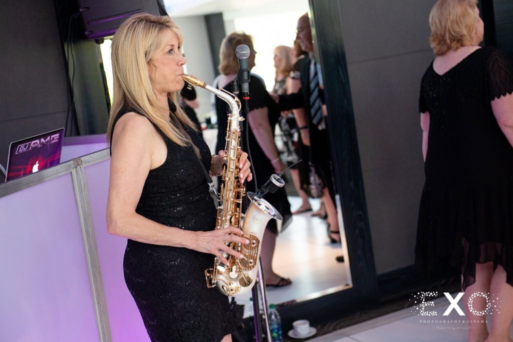 saxophone player at Harbor Club at Prime