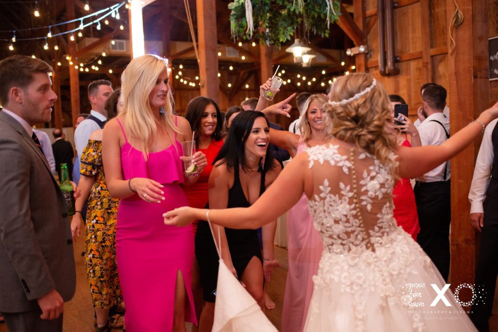 bride and guests dancing