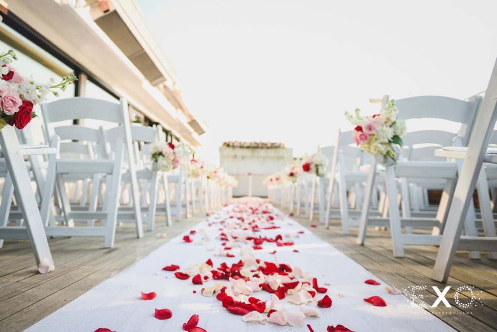 rose petals on the aisle at Harbor Club at Prime