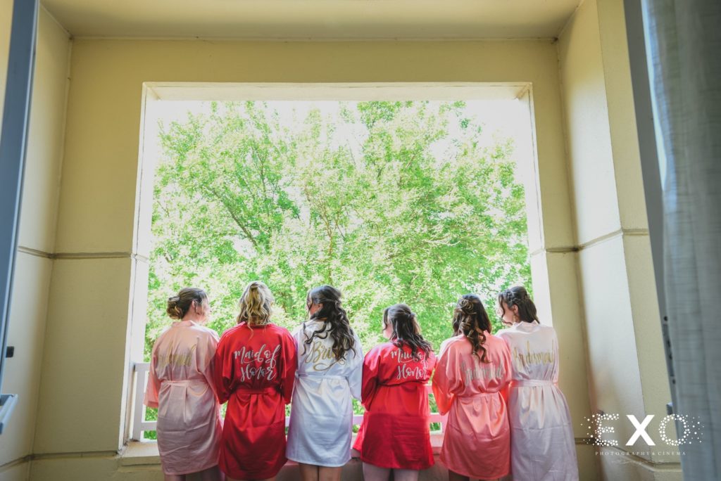 bride and bridesmaids in customized robes